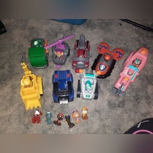 Set of paw patrol vehiclesand extra characters